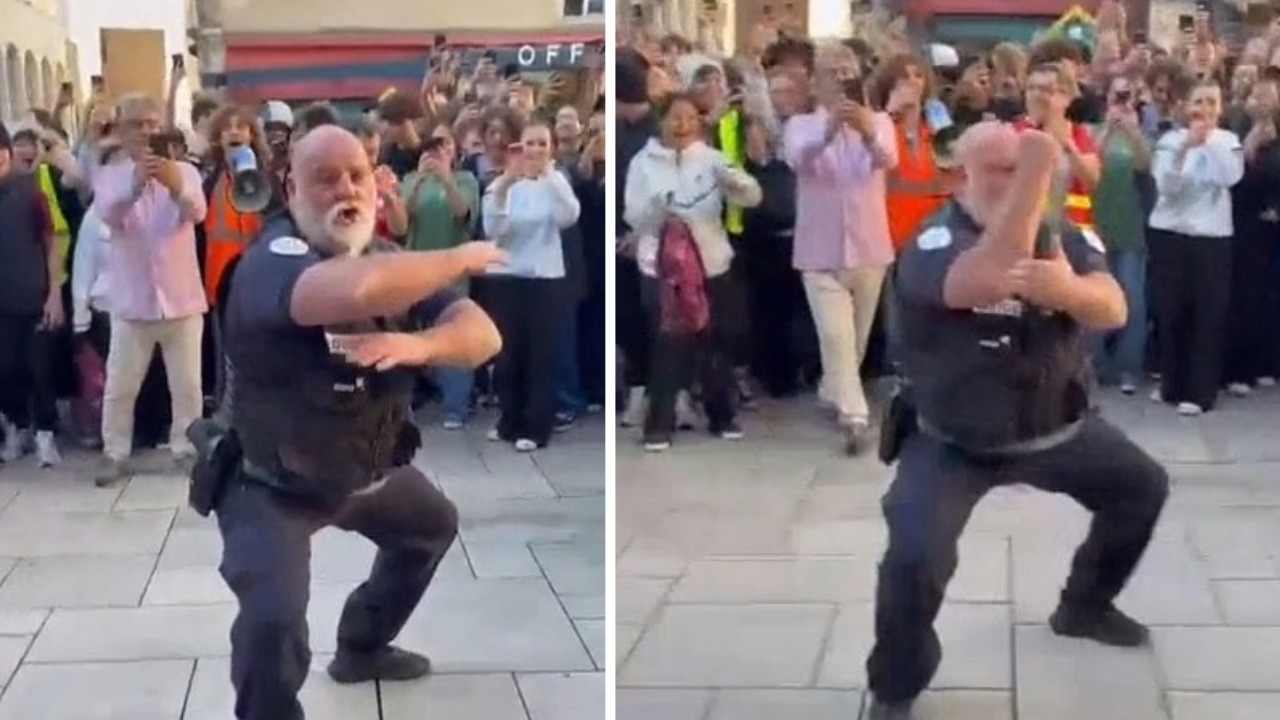 Police officer cheered by teenagers in French school protest