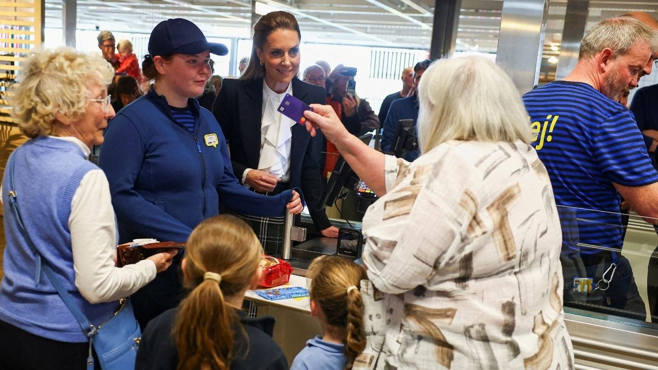 William and Kate surprise Ikea shoppers as they help out behind counters